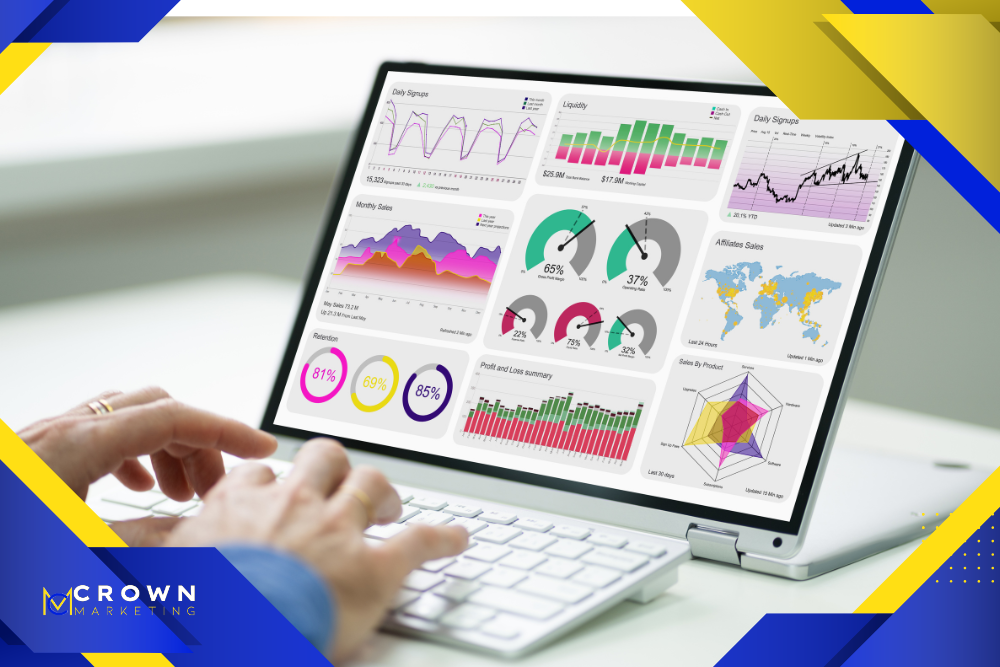 Interactive analytics dashboard displayed on a laptop for Crown Marketing digital marketing company.