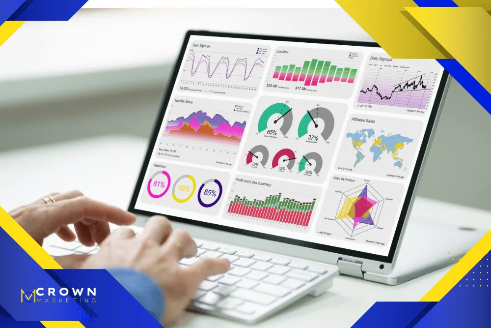 Interactive analytics dashboard displayed on a laptop for Crown Marketing digital marketing company.