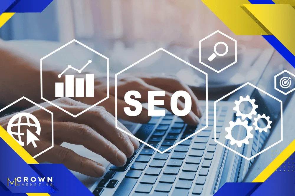 Hands on a keyboard with SEO icons, representing Crown Marketing’s digital marketing work to improve service area rankings.