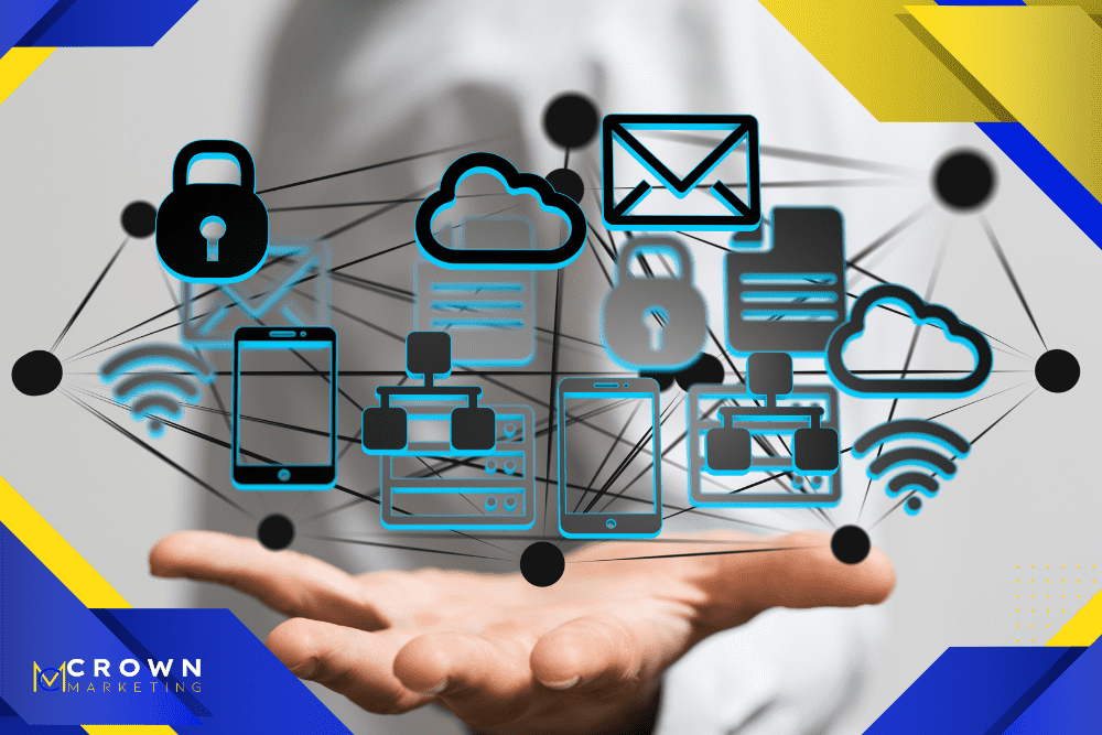 A hand holds digital icons, including cloud and email, symbolizing Crown Marketing's digital marketing services.| Crown Marketing Digital Marketing Agency Las Vegas